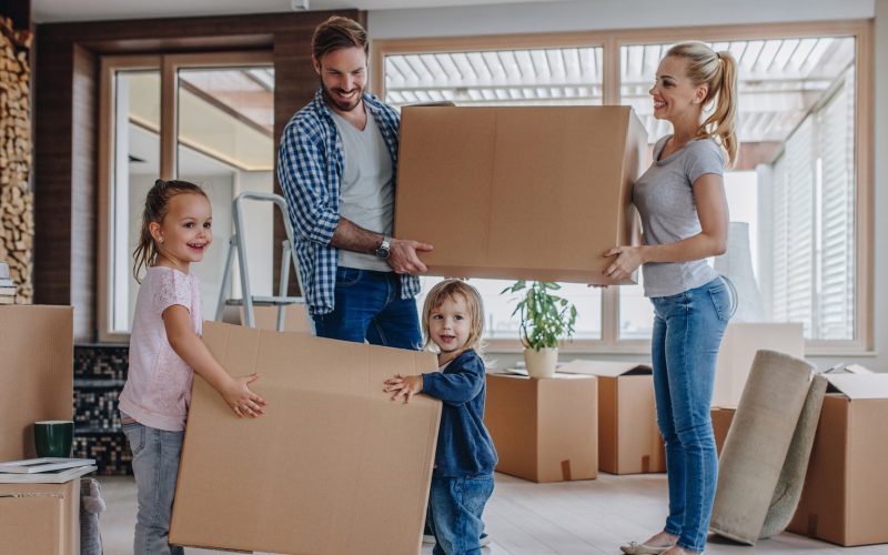 Young family moving into a new house