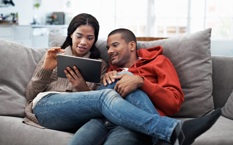 Couple looking at tablet