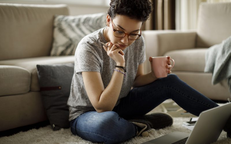 Young woman working at home