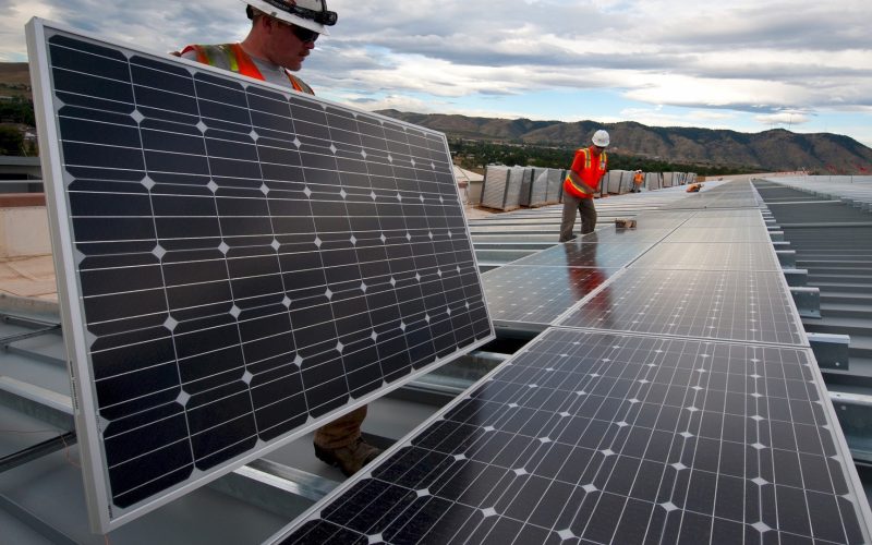 Large solar panel installation on rooftop