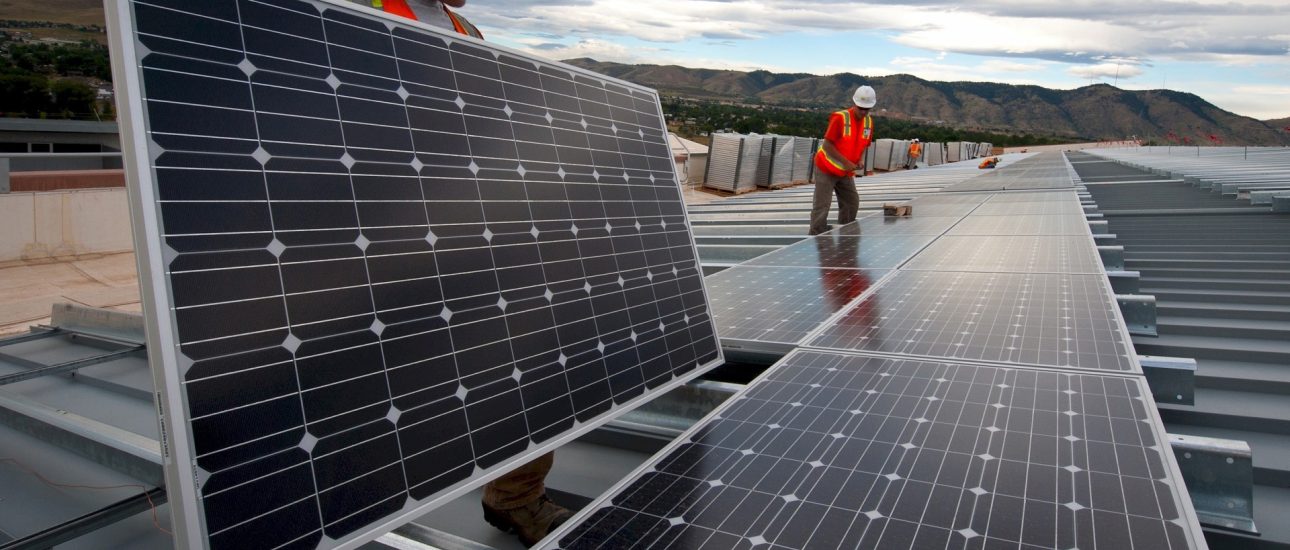 Large solar panel installation on rooftop