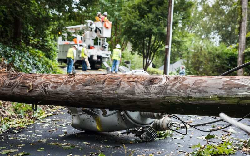 Down power lines and electric equipment in residential neighborhood