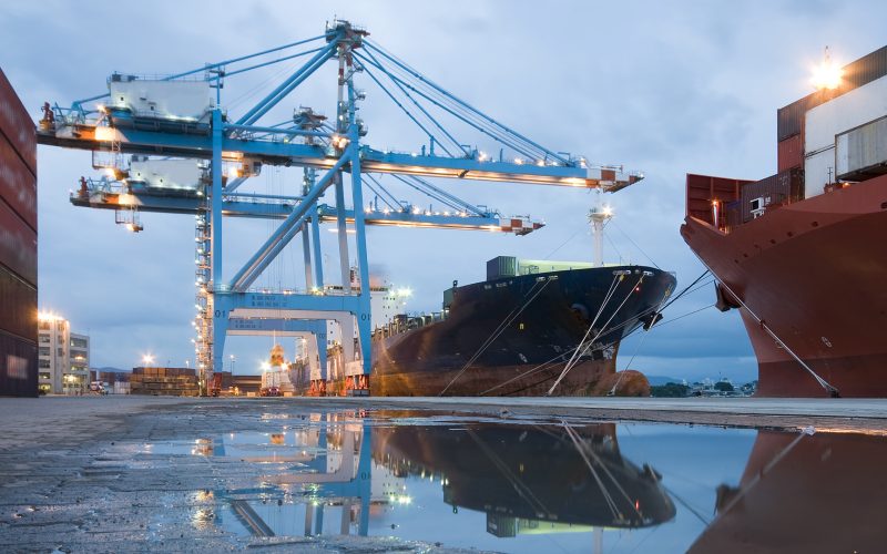 Port cranes loading ship